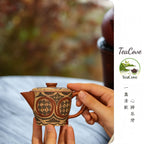 Cai Tao Xu Yu    130cc - Yixing Zisha Purple Clay Teapot