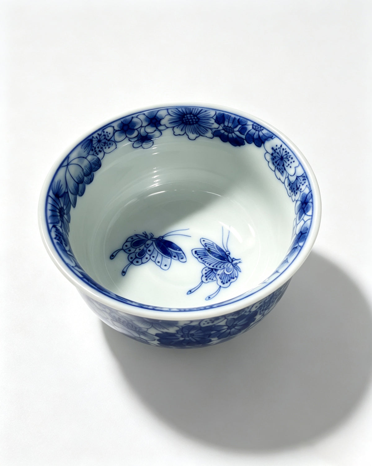 "Butterflies Amidst Flowers" Blue and White Tea Tasting Cup       60ml   -Jingdezhen porcelain