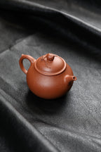 Shou Tao     130cc   - Yixing Zisha Purple Clay Teapot